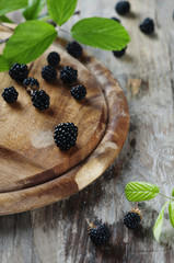 Fresh sweet blackberry on the wooden table