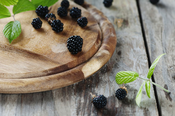 Fresh sweet blackberry on the wooden table
