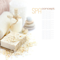 Handmade soap with oatmeal and milk on a white background