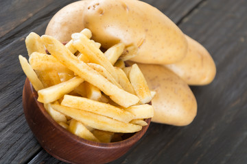 french fries on wood background
