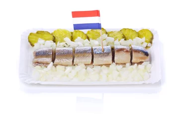 Foto op Aluminium Dutch herring ('haring') with onions and pickles © sara_winter