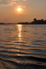 Sunrise over the sea.
Sunrise sunlight reflection on sea water