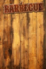Poster barbecuelabel genageld op een houten ondergrond © Paulista