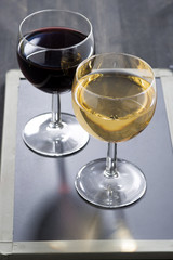 two glasses of wine on a blackboard