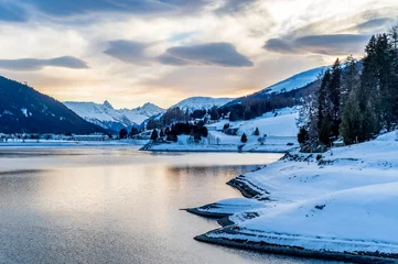 Foto op Canvas Evening winter scenery of Davos Lake, Switzerland. © borisbelenky