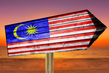 Malaysia Flag wooden sign on beach background