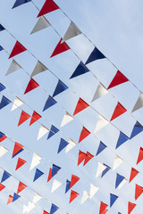 Obraz premium Red white and blue triangular bunting