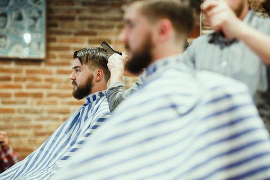 Bearded hipster in a barber shop