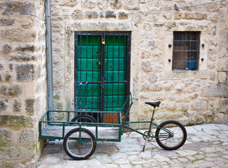 Fototapeta na wymiar Bike-cart in yard, old town of Kotor, Montenegro