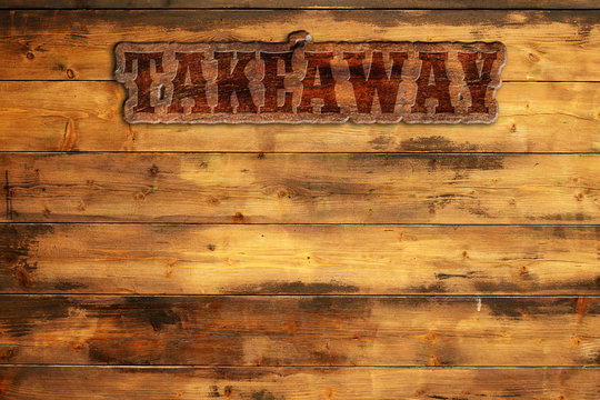 takeaway signboard nailed to a wooden wall