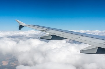 Fototapeta na wymiar Looking through window airplane