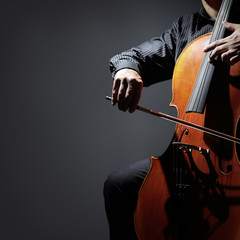 Cello player or cellist musician performing