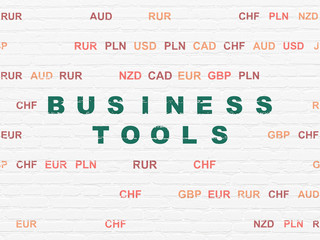 Finance concept: Business Tools on wall background