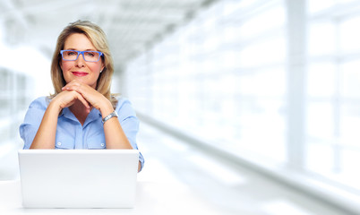 Beautiful business lady with laptop.