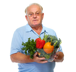 Senior man with vegetables.