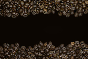 a border of coffee beans on a black background