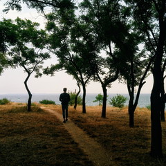 Tourist walking near the seaside
