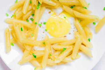 Fried eggs with pasta