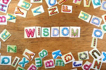 Colorful letters spelled as wisdom