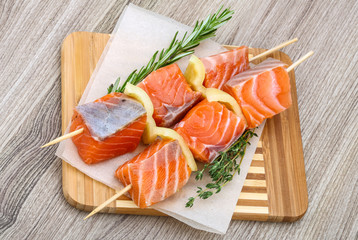 Raw salmon skewers