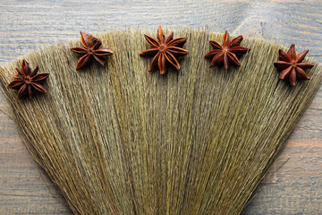 Star anise on wooden background
