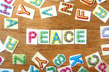 Colorful letters spelled as peace