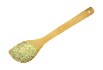 Wood spoon with dry balsamic vinegar dressing mix