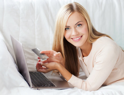 businesswoman with laptop and credit card