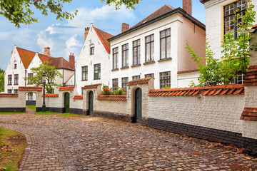 Naklejka premium Bruges historical pitched roofs of Begijnhof 