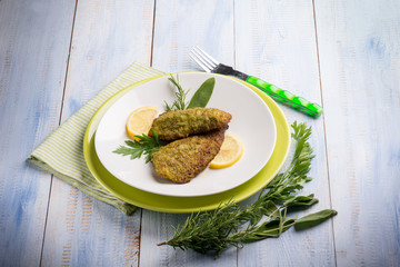 breaded fish with aromatic herbs
