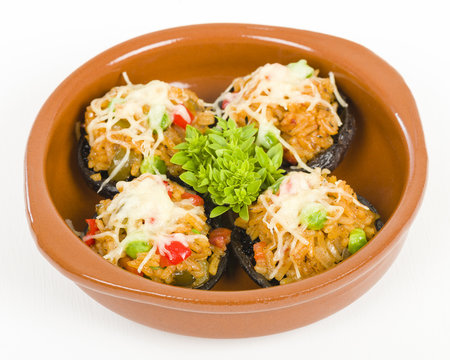 Stuffed Mushrooms - Mushrooms topped with cooked spicy rice and cheese.
