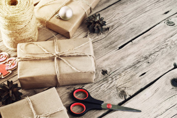 Christmas presents on a wooden table closeup