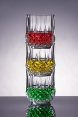 Drinks stacked light a stoplight.