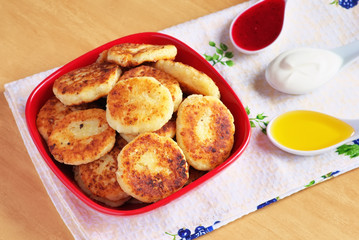 Syrniki. Cottage cheese pancakes. Fritters of cottage cheese