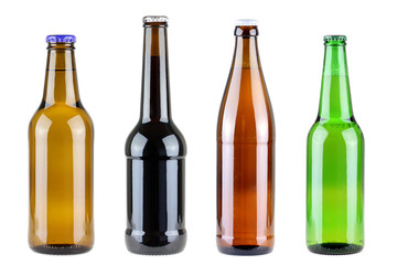 four differen beer bottles isolated on white