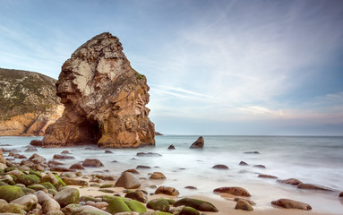 Beautiful rock formation on a isolated beach  - 91362124