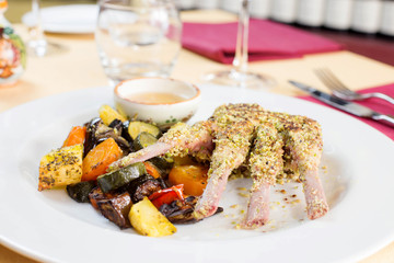 lamb cutlet cooked with pistachio crust and grilled vegetables
