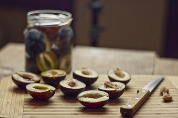 plums on a wooden table