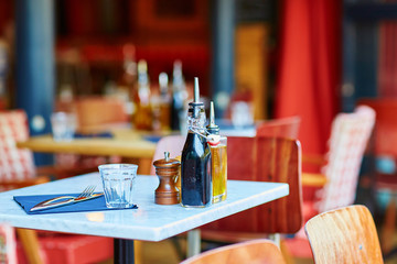 Table of traditional outdoor French cafe in Paris