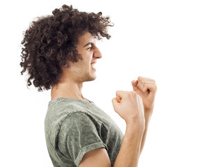 Portrait of a young man with her fist raised