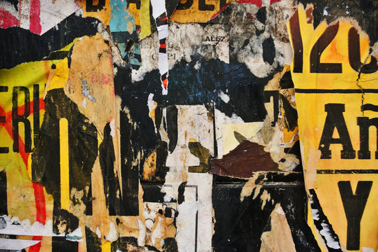 Random background collage paper texture on eroded wall