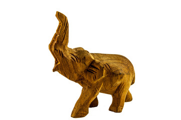 Elephant with a raised trunk carved out of wood