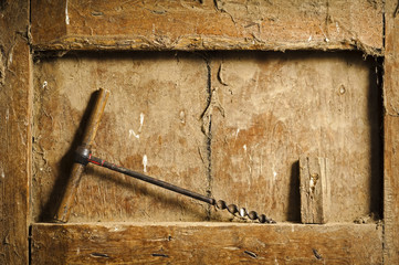 old  hand tools on antique wooden panel
