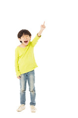 Happy little boy with pointing gesture