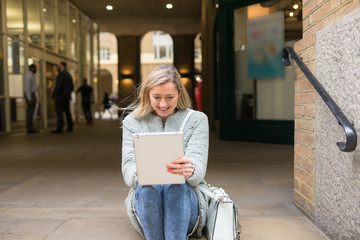 A beautiful woman with shopping bags in shopping street, London