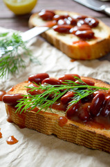 Bruschetta with red haricot bean, tomato sauce and dill