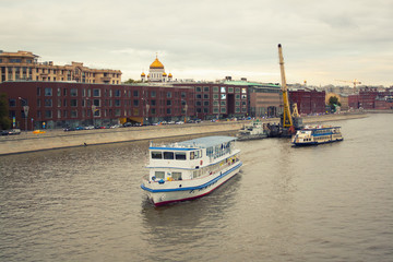 Fototapeta premium A Ship At Moscow River Near The Road