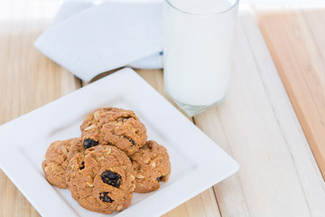Delicious raisin cookies and a glass of milk