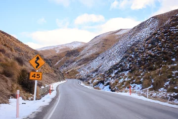 Deurstickers beautiful mountain road from lake wanaka to queen town south isl © stockphoto mania