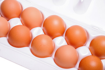 Десяток куриных яиц в упаковке
